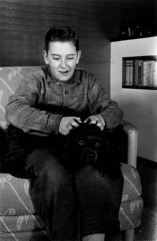 12 year
            old paul with his dog