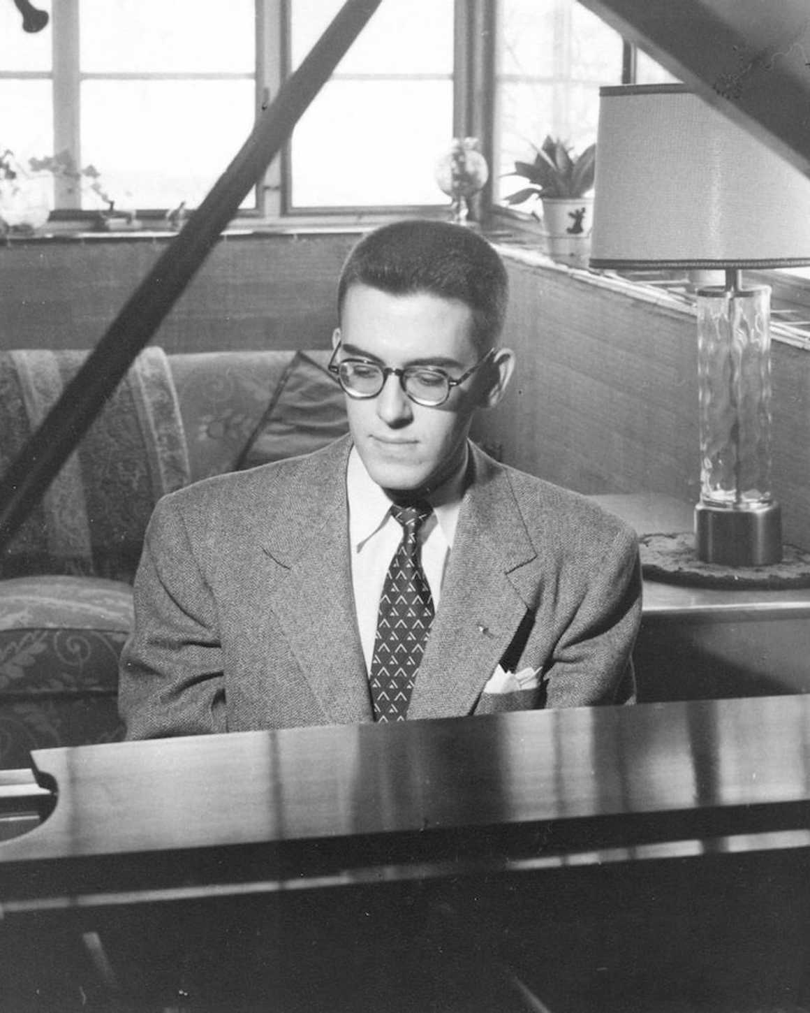 young paul lyddon playing the piano